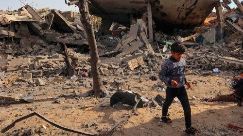 Children play in the rubble of a damaged building where two hostages were reportedly held before ... Children play in the rubble of a damaged building where two hostages were reportedly held before ...