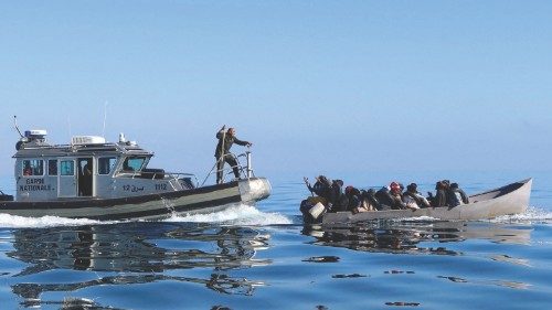 FILE PHOTO: Tunisian coast guards try to stop migrants at sea during their attempt to cross to ... FILE PHOTO: Tunisian coast guards try to stop migrants at sea during their attempt to cross to ...