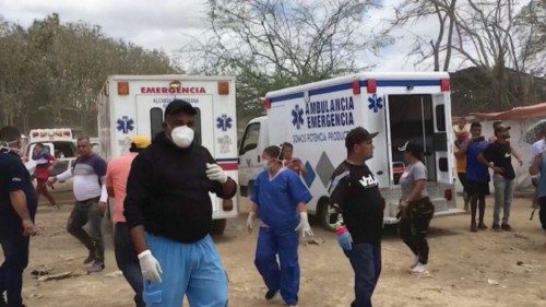 Ambulances are parked at Guacara River Port following the collapse of an illegal gold mine in La ... Ambulances are parked at Guacara River Port following the collapse of an illegal gold mine in La ...