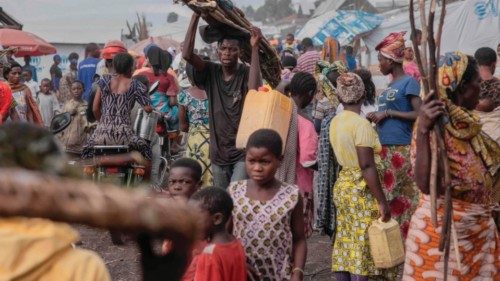 Displaced people go about their daily business west of the town of Goma, eastern Democratic Republic ... Displaced people go about their daily business west of the town of Goma, eastern Democratic Republic ...