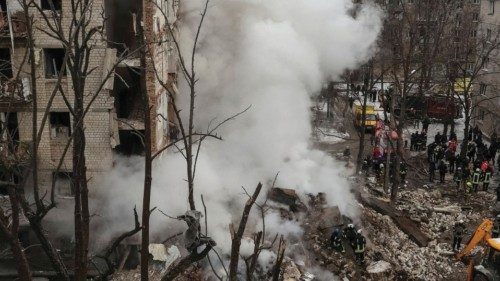 FILE PHOTO: Rescuers work at a site of a residential building heavily damaged during a Russian ... FILE PHOTO: Rescuers work at a site of a residential building heavily damaged during a Russian ...