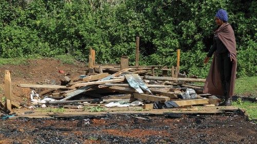 Margaret Nasieku, a teacher and a member of the Ogiek community, looks at the remains of St. ... Margaret Nasieku, a teacher and a member of the Ogiek community, looks at the remains of St. ...