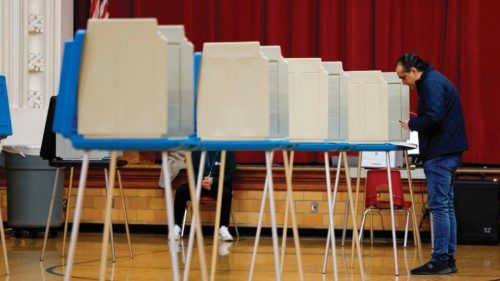 Voters cast their ballots at a polling location during the Michigan presidential primary in ... Voters cast their ballots at a polling location during the Michigan presidential primary in ...