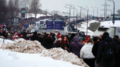TOPSHOT - In this video grab, mourners walk in a procession towards the Borisovo cemetery during the ... TOPSHOT - In this video grab, mourners walk in a procession towards the Borisovo cemetery during the ...