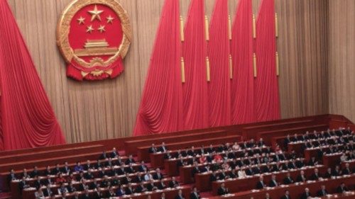 Chinese Premier Li Qiang bows after delivering the work report at the opening session of the ...