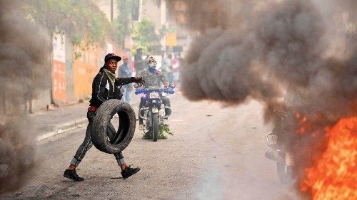 (FILES) A protester burns tires during a demonstration calling for the resignation of Prime Minister ... (FILES) A protester burns tires during a demonstration calling for the resignation of Prime Minister ...