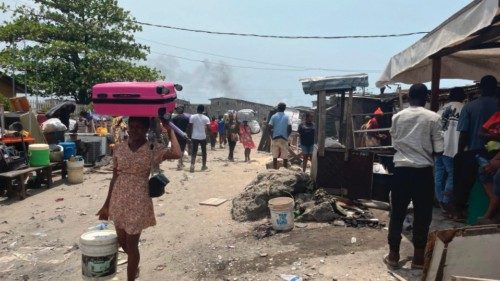 Residents carry their belongings after the demolition in a part of Jakande neighbourhood in Lagos on ... Residents carry their belongings after the demolition in a part of Jakande neighbourhood in Lagos on ...