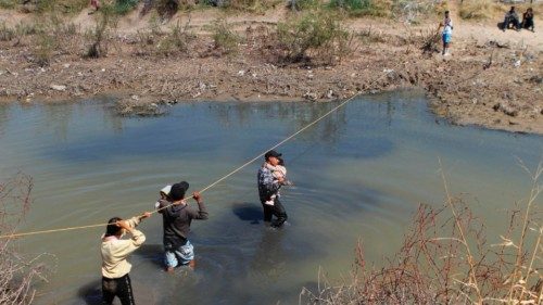 Migrants seeking asylum in the United States cross the Rio Bravo on the border of Ciudad Juarez, ...