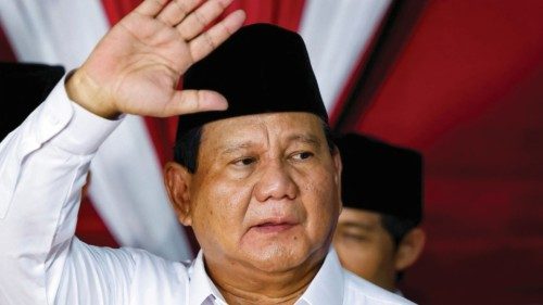 Indonesia's front-runner presidential candidate and Defence Minister Prabowo Subianto waves as he ... Indonesia's front-runner presidential candidate and Defence Minister Prabowo Subianto waves as he ...