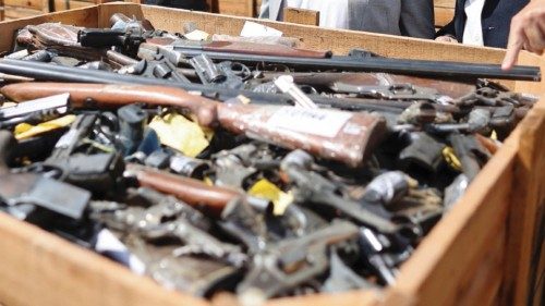 Argentina's Security Minister Patricia Bullrich looks at weapons seized from the city of Rosario and ... Argentina's Security Minister Patricia Bullrich looks at weapons seized from the city of Rosario and ...