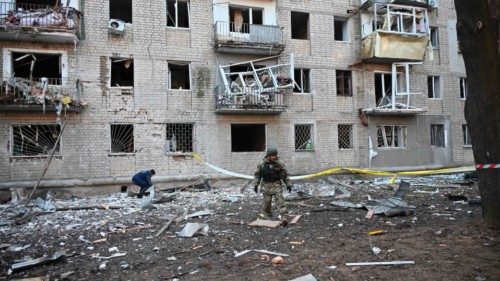 TOPSHOT - A rescuer works outside a residential building damaged as a result of Russian strikes in ... TOPSHOT - A rescuer works outside a residential building damaged as a result of Russian strikes in ...