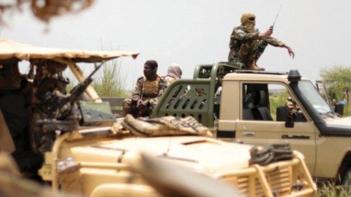 FILE PHOTO: Malian soldiers are pictured during a patrol with soldiers from the new Takuba force ... FILE PHOTO: Malian soldiers are pictured during a patrol with soldiers from the new Takuba force ...