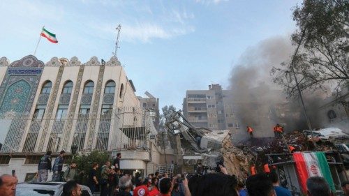 TOPSHOT - Emergency and security personnel search the rubble at the site of strikes which hit a ... TOPSHOT - Emergency and security personnel search the rubble at the site of strikes which hit a ...