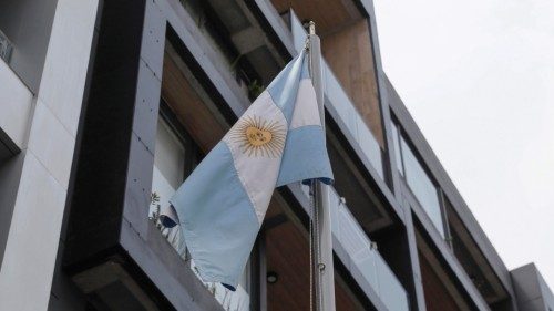 epa11248461 A flag of the Argentine Republic in front of the building where the Argentine embassy, ...