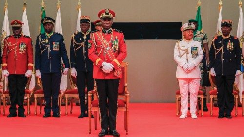 (FILES) Gabon's new strongman General Brice Oligui Nguema (C) looks on as he is inaugurated as ... (FILES) Gabon's new strongman General Brice Oligui Nguema (C) looks on as he is inaugurated as ...