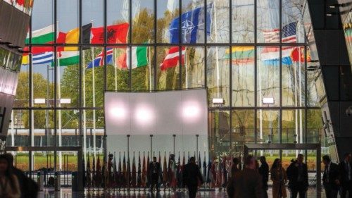 epa11258475 Flags of 32 NATO member countries fly outside the Agora during NATOâs 75th anniversary ...