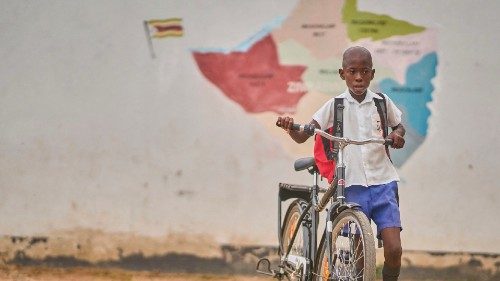 Joaquim Homera, a primary school learner heads to park his bicycle at school at Mabale primary ... Joaquim Homera, a primary school learner heads to park his bicycle at school at Mabale primary ...