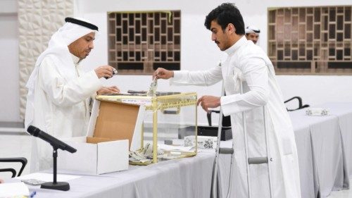 epa11258890 A man casts his vote during the Parliamentary elections at a polling station, in Kuwait ... epa11258890 A man casts his vote during the Parliamentary elections at a polling station, in Kuwait ...