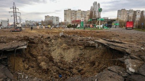 epa11261875 A bomb crater at the scene of an overnight shelling attack in Kharkiv, northeastern ... epa11261875 A bomb crater at the scene of an overnight shelling attack in Kharkiv, northeastern ...