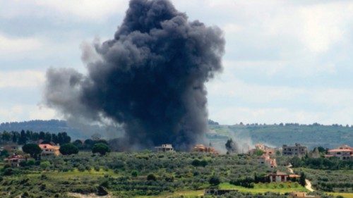 TOPSHOT - Smoke billows after an Israeli strike on the southern Lebanese border village of Tayr ... TOPSHOT - Smoke billows after an Israeli strike on the southern Lebanese border village of Tayr ...