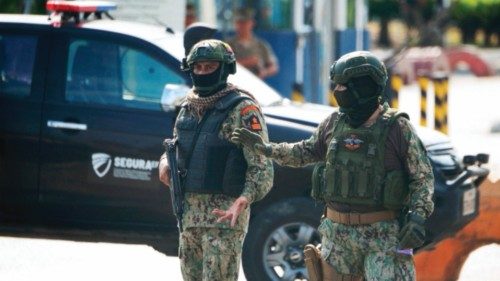 Army soldiers guard the surroundings of the Naval Hospital, where Ecuador's ex-vice president Jorge ... Army soldiers guard the surroundings of the Naval Hospital, where Ecuador's ex-vice president Jorge ...