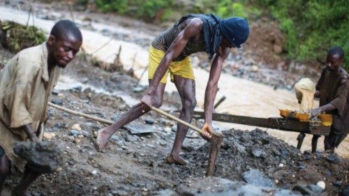A group of artisanal miners work under the rain to mine gold from a riverbed south of Walungu, ... A group of artisanal miners work under the rain to mine gold from a riverbed south of Walungu, ...
