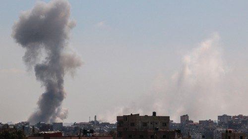 Smoke billows following Israeli bombardment in Nuseirat, central Gaza, on April 12, 2024, amid ... Smoke billows following Israeli bombardment in Nuseirat, central Gaza, on April 12, 2024, amid ...