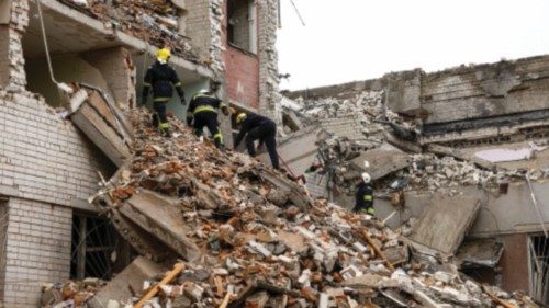 Rescuers work at the site of a destroyed hotel during a Russian missile strike, amid Russia's ... Rescuers work at the site of a destroyed hotel during a Russian missile strike, amid Russia's ...