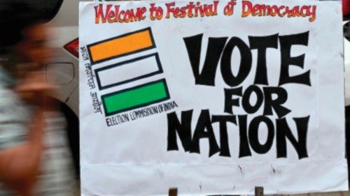 TOPSHOT - A pedestrian walks past an election themed painting placed by art students along a street ... TOPSHOT - A pedestrian walks past an election themed painting placed by art students along a street ...
