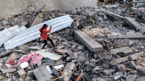 A girl walks through rubble in Rafah in the southern Gaza Strip on April 24, 2024 following reported ... A girl walks through rubble in Rafah in the southern Gaza Strip on April 24, 2024 following reported ...