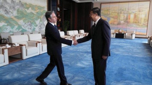 U.S. Secretary of State Antony Blinken shakes hands with Shanghai Party Secretary Chen Jining as ...