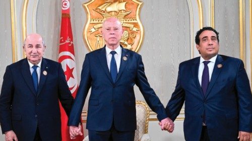 epa11294764 A handout photo made available by the Tunisian Presidency press service shows Tunisian ...