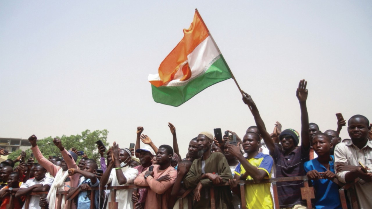 Nigeriens gather in a street to protest against the U.S. military presence, in Niamey, Niger April ...