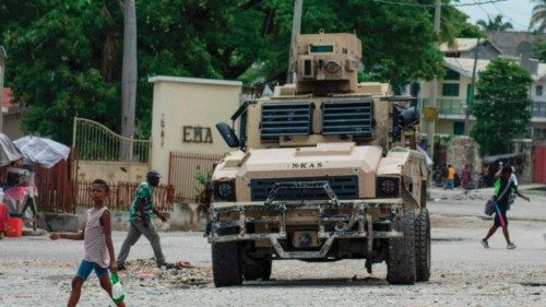 A child walks by a police vehicle in Port-au-Prince, Haiti, on April 26, 2024. A long-awaited ... A child walks by a police vehicle in Port-au-Prince, Haiti, on April 26, 2024. A long-awaited ...