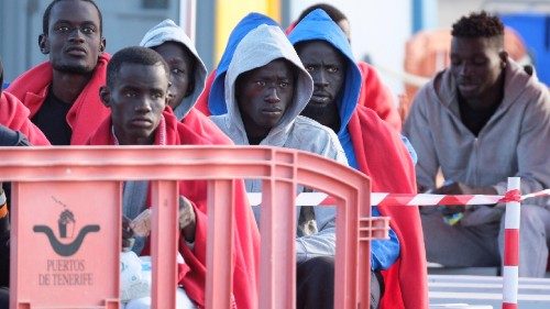 epa11308020 Some of the 101 Sub-saharan migrants who were rescued at sea to the south of Tenerife ...