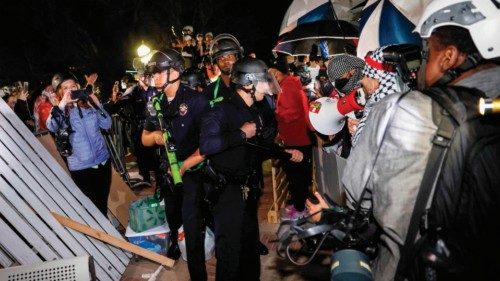 Police react while Pro-Palestinian students stand their ground after police breached their ... Police react while Pro-Palestinian students stand their ground after police breached their ...