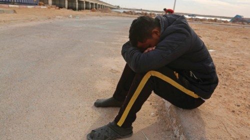 A migrant rescued by Tunisia's national guard during an attempted crossing of the Mediterranean by ... A migrant rescued by Tunisia's national guard during an attempted crossing of the Mediterranean by ...