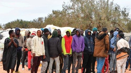 Migrant from Sub-Saharian Africa gather gather near their tents at a camp in Jebeniana in Tunisia's ... Migrant from Sub-Saharian Africa gather gather near their tents at a camp in Jebeniana in Tunisia's ...