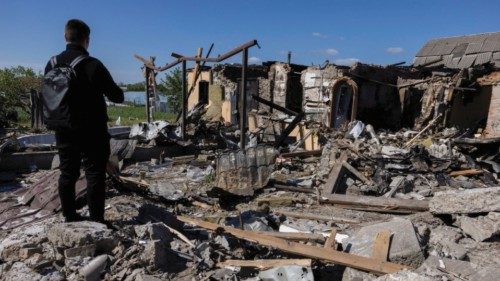 A man surveys the damage of a house that was hit during a Russian missile strike in Krasylivka, Kyiv ... A man surveys the damage of a house that was hit during a Russian missile strike in Krasylivka, Kyiv ...