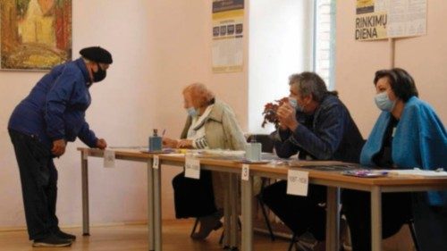 epa08735197 A man casts the ballot vote at a polling station during the general elections, in ... epa08735197 A man casts the ballot vote at a polling station during the general elections, in ...