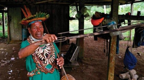 Delio Payaguaje, a Shaman from the Siona indigenous community, shows his fishing tools in the ... Delio Payaguaje, a Shaman from the Siona indigenous community, shows his fishing tools in the ...