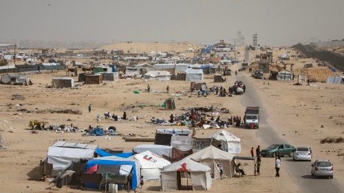 epa11333228 Internally displaced Palestinians prepare to leave with their belongings after an ... epa11333228 Internally displaced Palestinians prepare to leave with their belongings after an ...