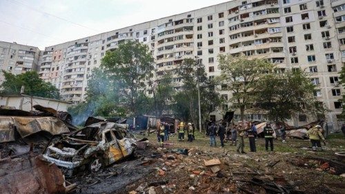 epa11340659 Ukrainian rescuers work at the site of a shelling of a residential area in Kharkiv, ... epa11340659 Ukrainian rescuers work at the site of a shelling of a residential area in Kharkiv, ...
