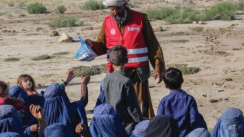 epa11339997 People affected by floods receive food in Falol village in Baghlan, Afghanistan, 13 May ... epa11339997 People affected by floods receive food in Falol village in Baghlan, Afghanistan, 13 May ...