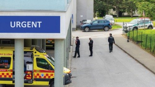 Police officers stand outside the F.D. Roosevelt University Hospital, where Slovak Prime Minister ...