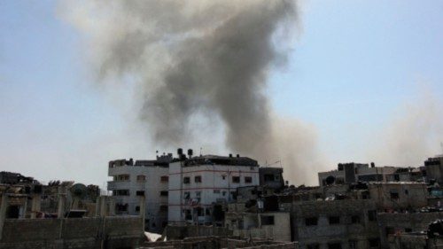 Smoke billows following Israeli bombardment over the Al-Daraj neighbourhood in Gaza City on May 21, ... Smoke billows following Israeli bombardment over the Al-Daraj neighbourhood in Gaza City on May 21, ...