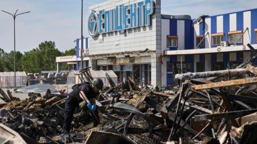 epa11371764 A policemen inspects the damage of yesterday's shelling of the hypermarket in Kharkiv, ... epa11371764 A policemen inspects the damage of yesterday's shelling of the hypermarket in Kharkiv, ...