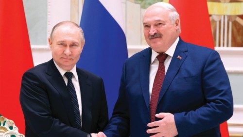 In this pool photograph distributed by the Russian state agency Sputnik, Russia's President Vladimir ... In this pool photograph distributed by the Russian state agency Sputnik, Russia's President Vladimir ...