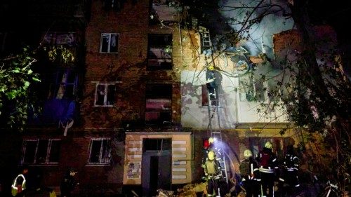epa11381050 Ukrainian rescuers working at the site of the shelling of a residential building in ... epa11381050 Ukrainian rescuers working at the site of the shelling of a residential building in ...