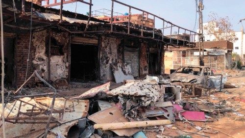 This picture taken on May 30, 2024, shows damaged shops in Omdurman. War has raged for more than a ... This picture taken on May 30, 2024, shows damaged shops in Omdurman. War has raged for more than a ...